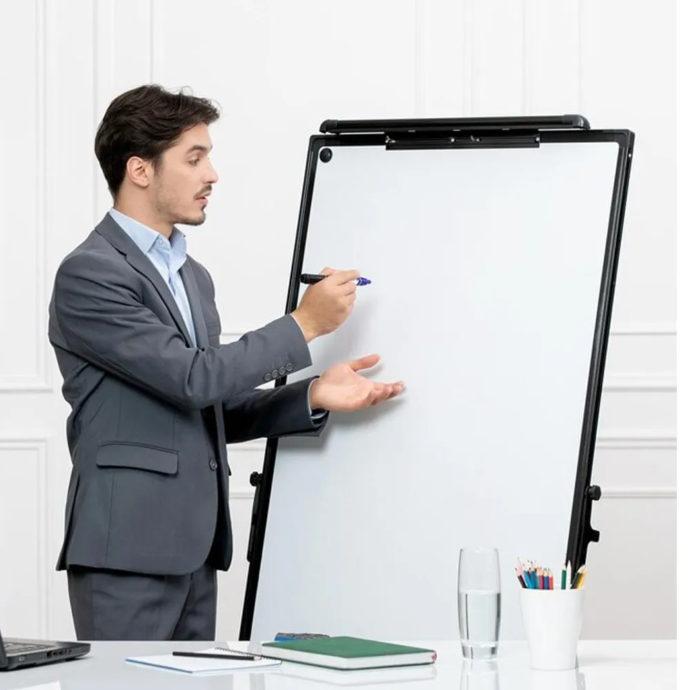 Presenter writing on a flip chart