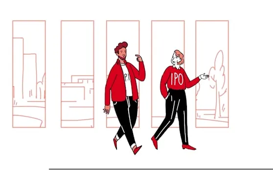 Two coworkers walking, one wearing an IPO sweater